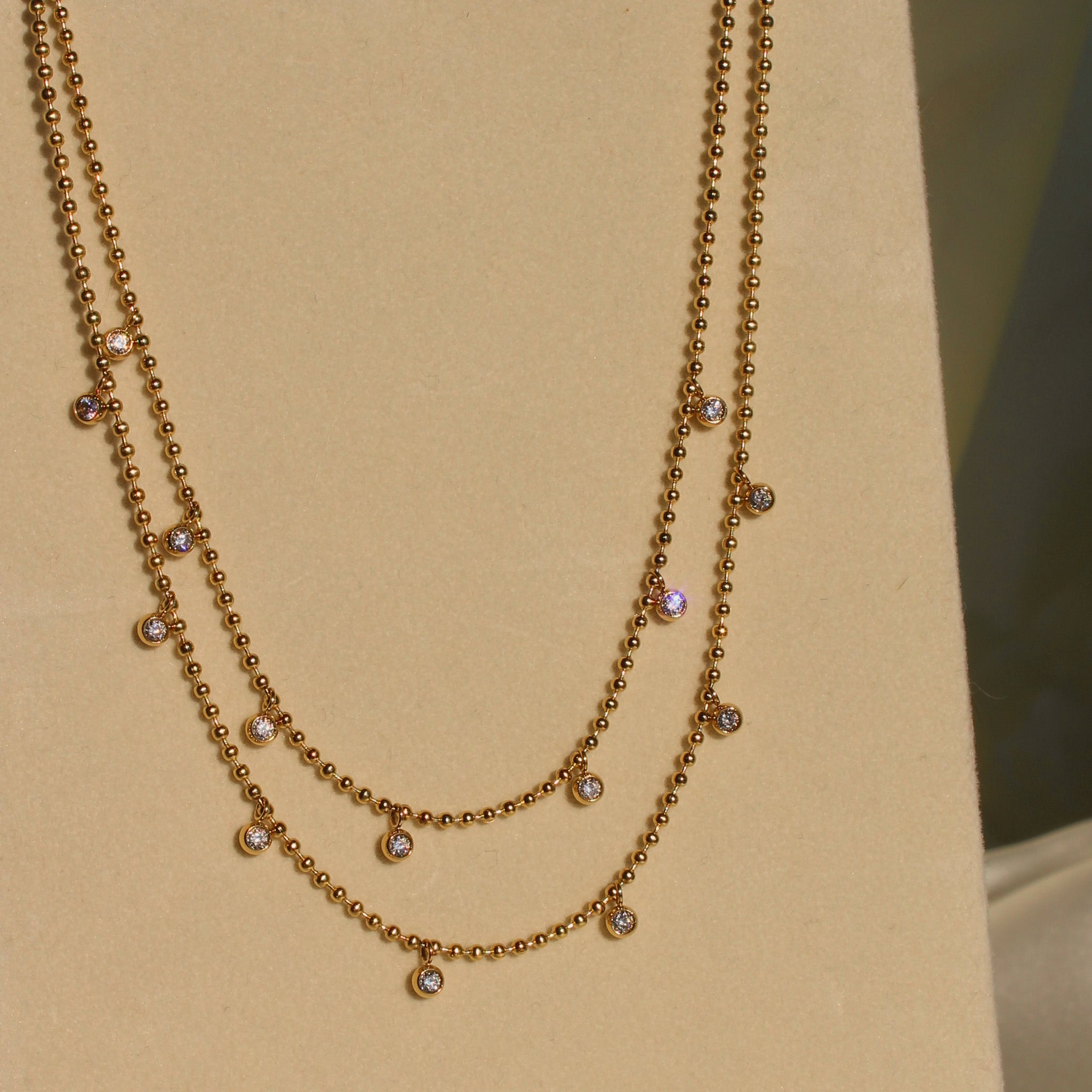 layered zirconia gold plated 18k stainless steel